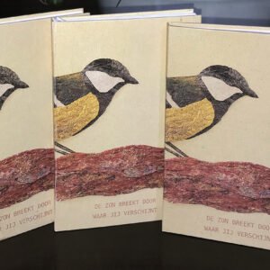 Een prachtig paar notitieboeken met een vogelthema, perfect voor het vastleggen van je gedachten en ideeën.